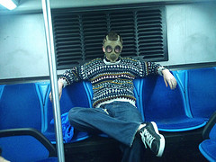 Must be stinky on the bus to wear a gas mask. LOL!
