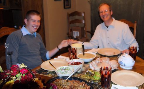 The guys goof off at the table.  It's my family tradition to take pictures of holiday table before anyone eats.  We have 3 generations of them.  However my group no longer does good china nor do we take it seriously any more.  