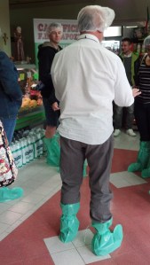 Our lovely clean room attire.  Hair nets and green boots.