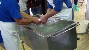 Here is the traditional way of cutting (mozz) by hand.  Amazingly Master Pepe could by feel make perfect  1/4 Kilo, 1/2 kilo, and 1 kilo balls of cheese.