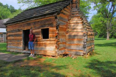 Mike in front of replica of Lincoln's childhood home in Knob Creek Kentucky.